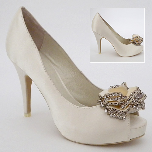 Ivory wedding shoes with hidden platform peep toe and elaborate flower 