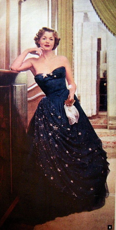 1950's Balmain strapless gown in midnight with gold stars adorning the milky-way.