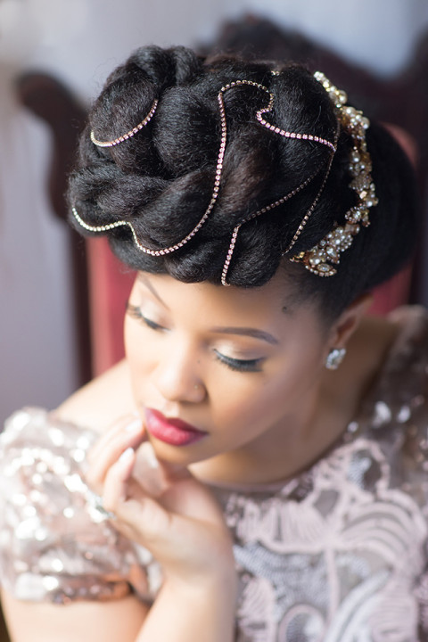 Our Laura Jayne crystal and pearl headband is joined by a rhinestone chain.  Stud earrings are by Erin Cole.