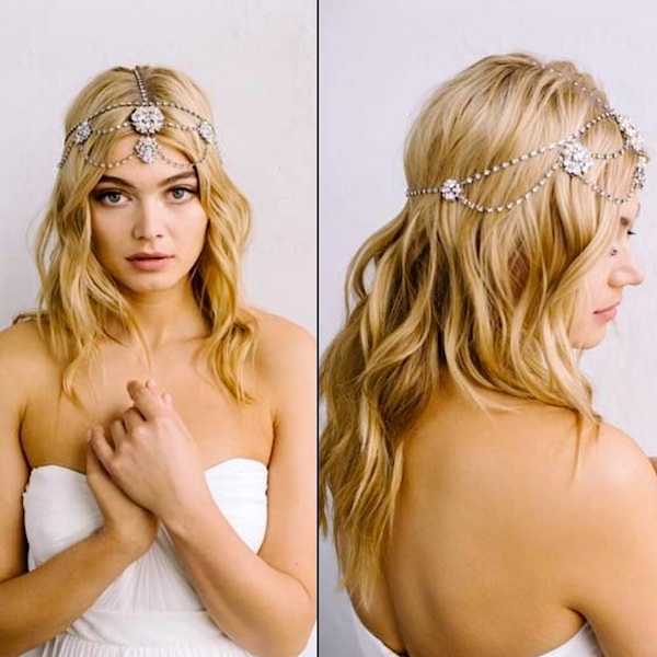 Matty statment bridal hair chain with large brooches worn at the front.