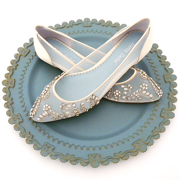 Those elusive flat bridal shoes. Our blog post highlighting our fabulous flat wedding shoes from Bella Belle and Badgley Mischka wore out pinners fingers :)